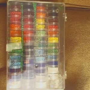 49 containers of small beads